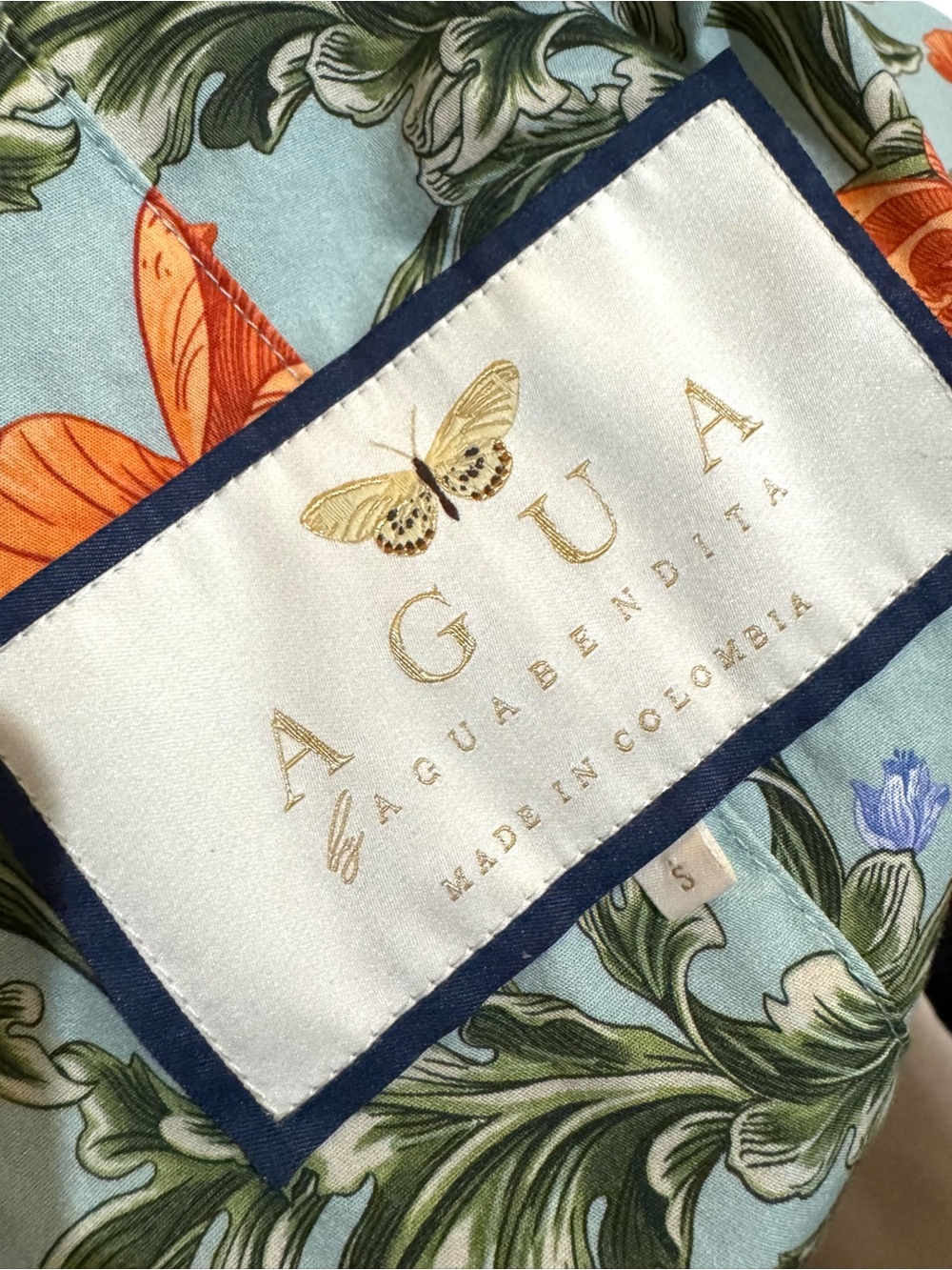 Agua Bendita Orange Floral Ruched Midi Dress on Light Blue - Picture 6 of 6